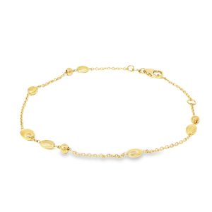 Yellow gold bracelet with round and oval details in 18k gold