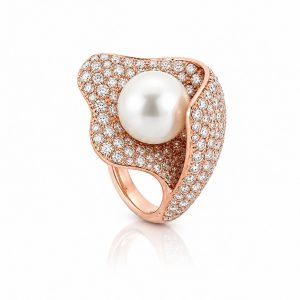 18 karat rose gold ring with diamond and pearl